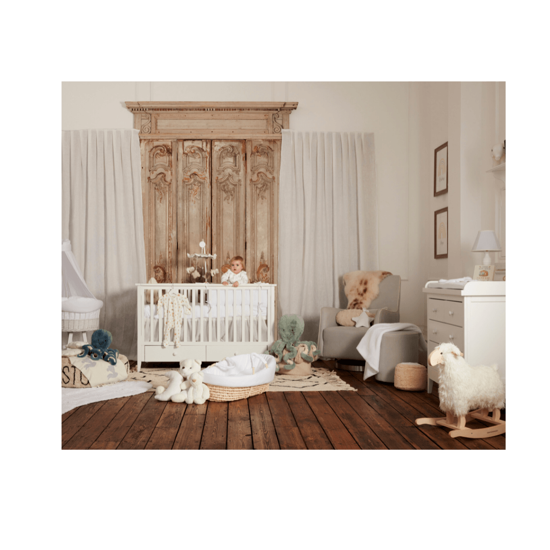 kensington cot bed in baby nursery