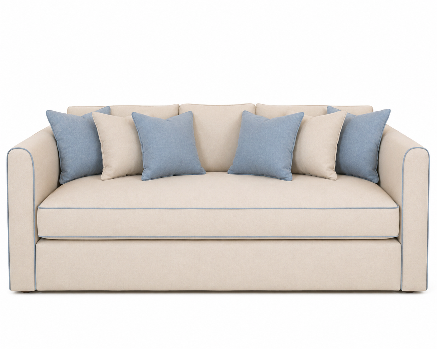 A modern upholstered sofabed in warm cream fabric with contrasting light blue piping, styled with six throw pillows (four cream and two light blue) against a solid white background.